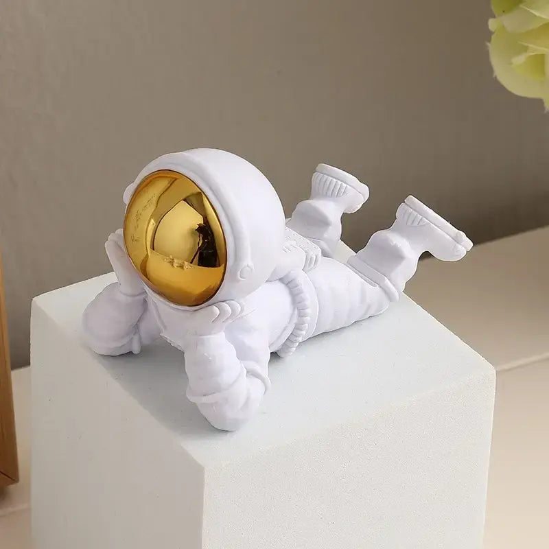 Decorative astronaut phone holder for desk and home décor