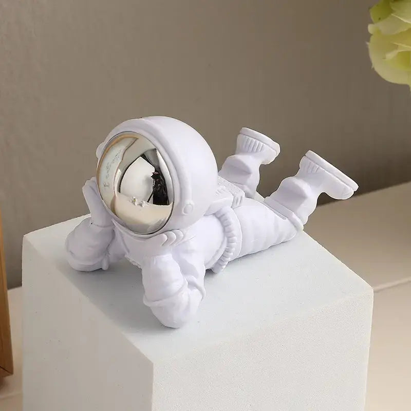 Decorative astronaut phone holder for desk and home décor