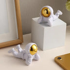 Decorative astronaut phone holder for desk and home décor