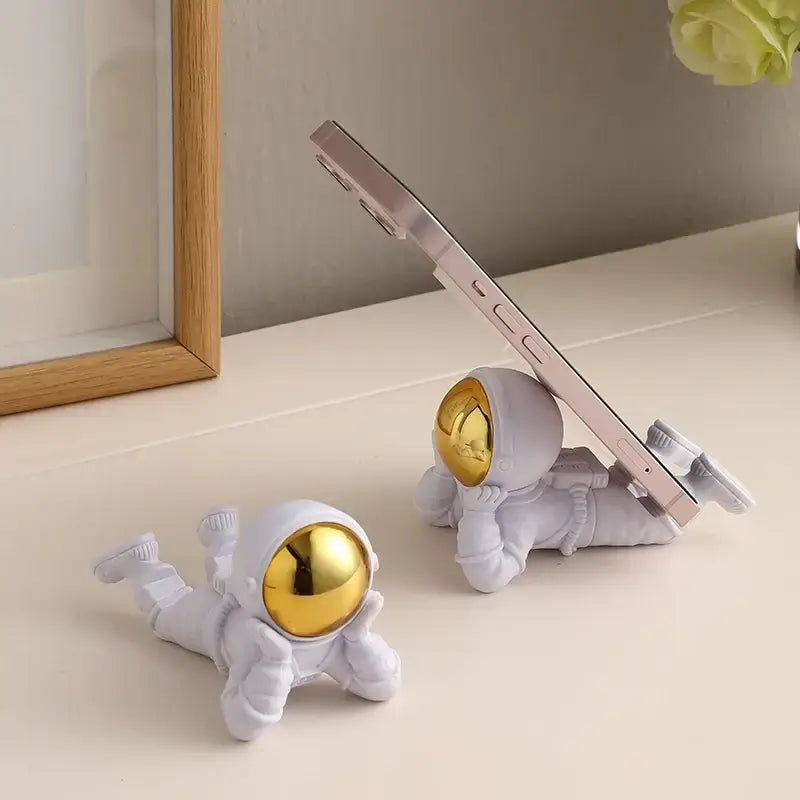 Decorative astronaut phone holder for desk and home décor