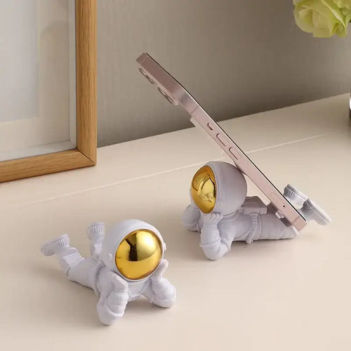 Decorative astronaut phone holder for desk and home décor