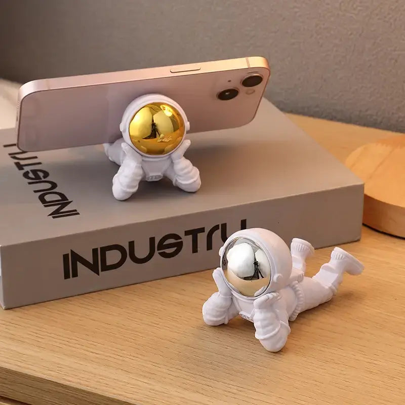 Decorative astronaut phone holder for desk and home décor