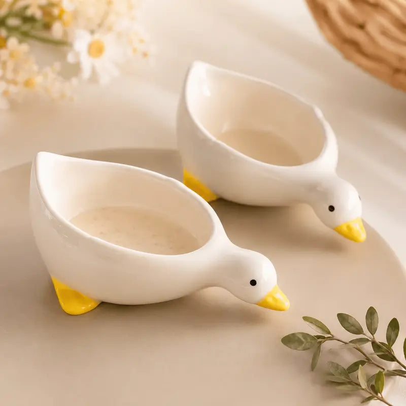 Ceramic duck serving bowl set for elegant dining table presentation