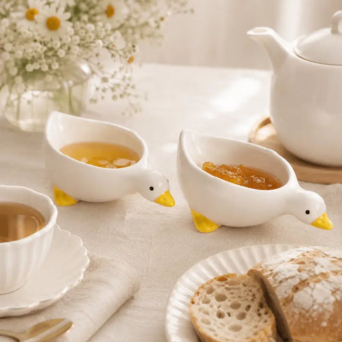 Ceramic duck serving bowl set for elegant dining table presentation