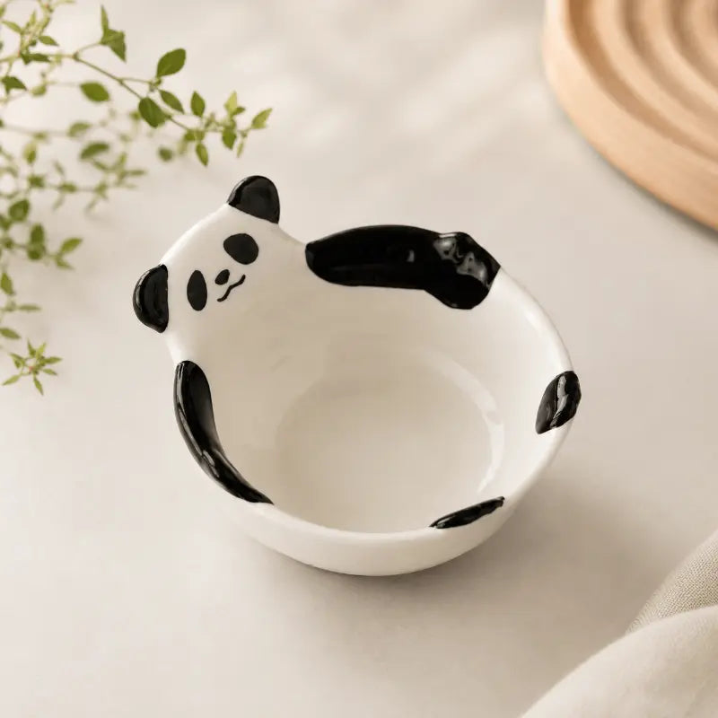 Ceramic panda serving bowl for elegant dining table presentation