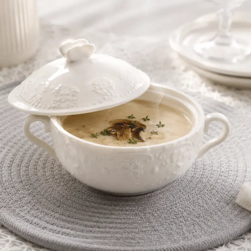 Embossed covered porcelain bowl for elegant dining and table presentation