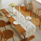 Embroidered cotton linen table runner with tassel details for dining table décor