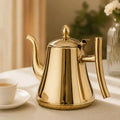 Stainless steel tea pot with infuser for elegant tea serving