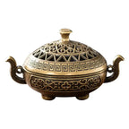 Vintage metal incense burner with decorative tripod design for home décor