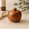 Wooden spice jar with spoon for elegant kitchen storage and organisation