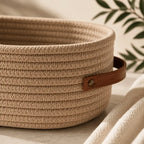 Woven storage basket with handles for stylish home organisation and décor